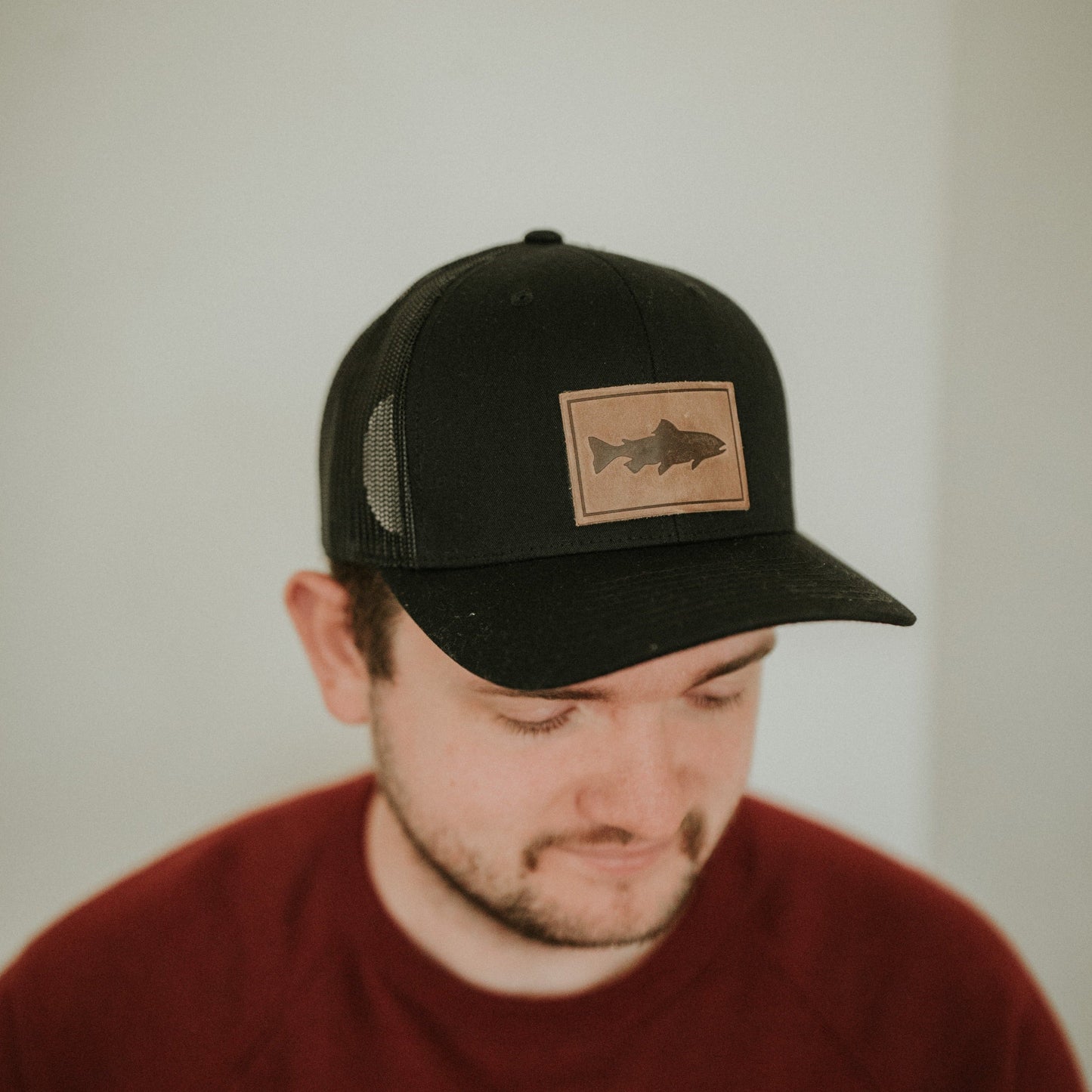 Leather Fish Patch Trucker Hat