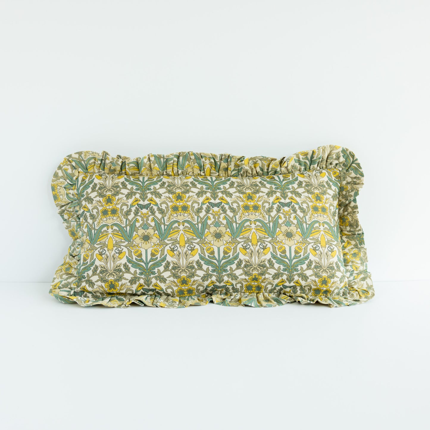 Ruffled Lumbar Pillow with Floral Pattern