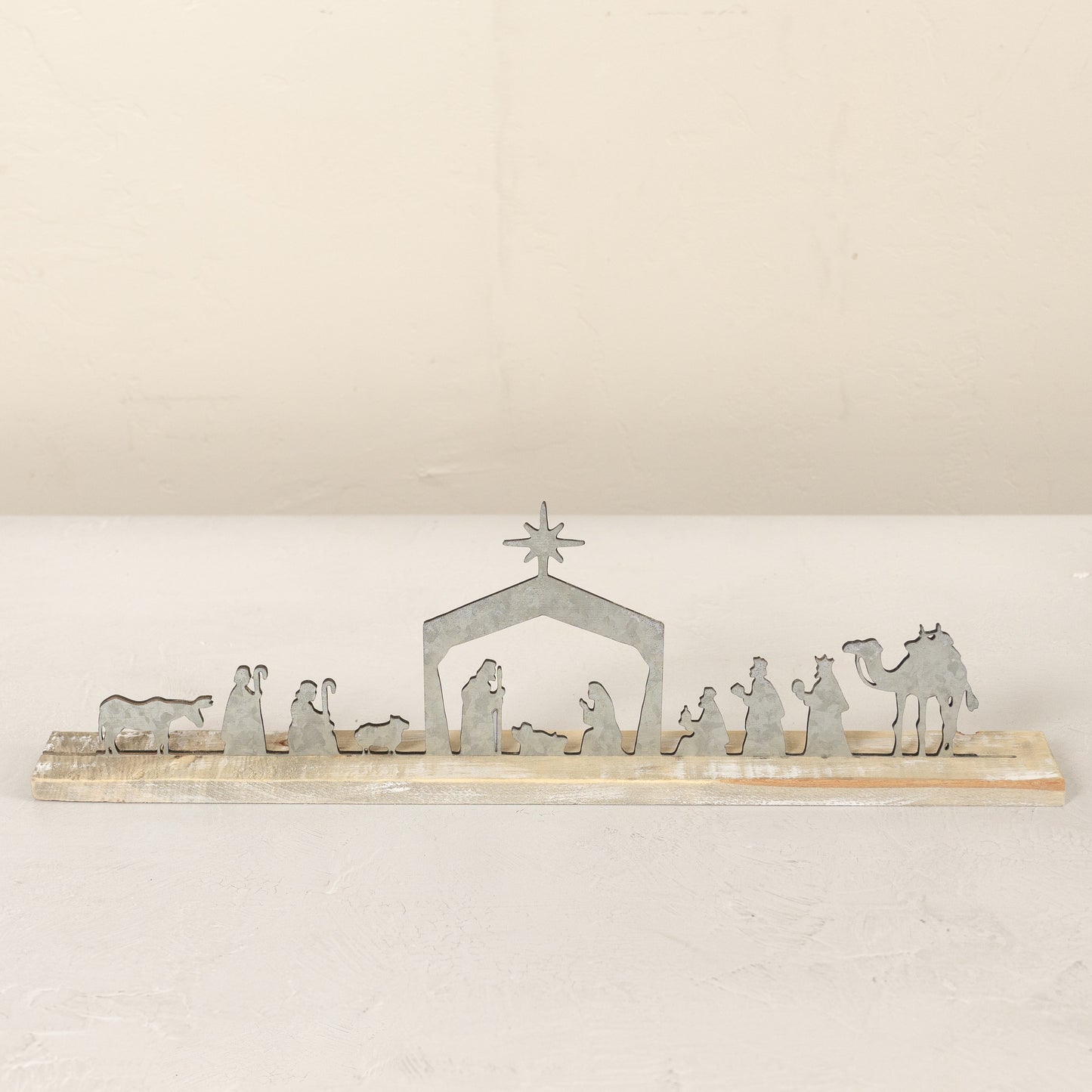 Metal Nativity on a Wooden Stand